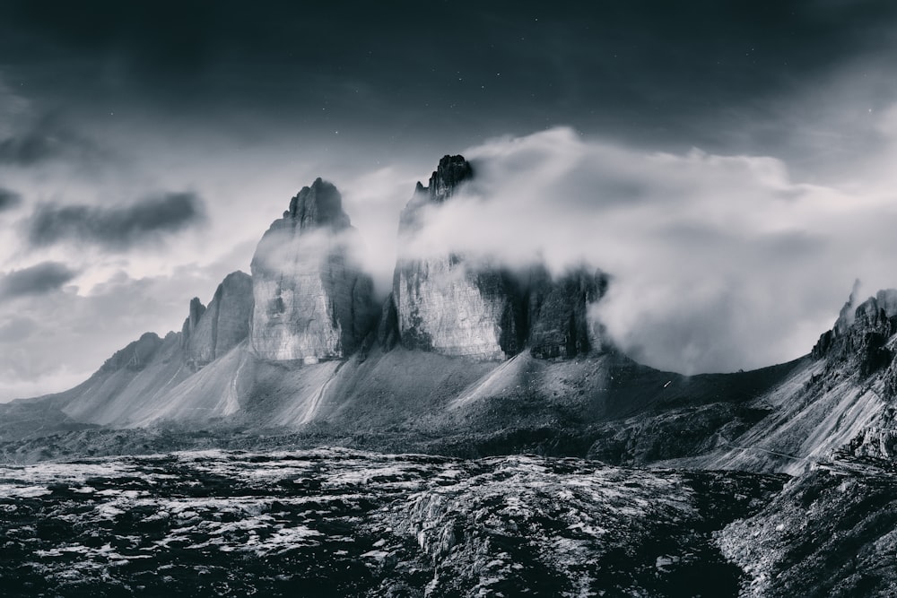 a black and white photo of a mountain range