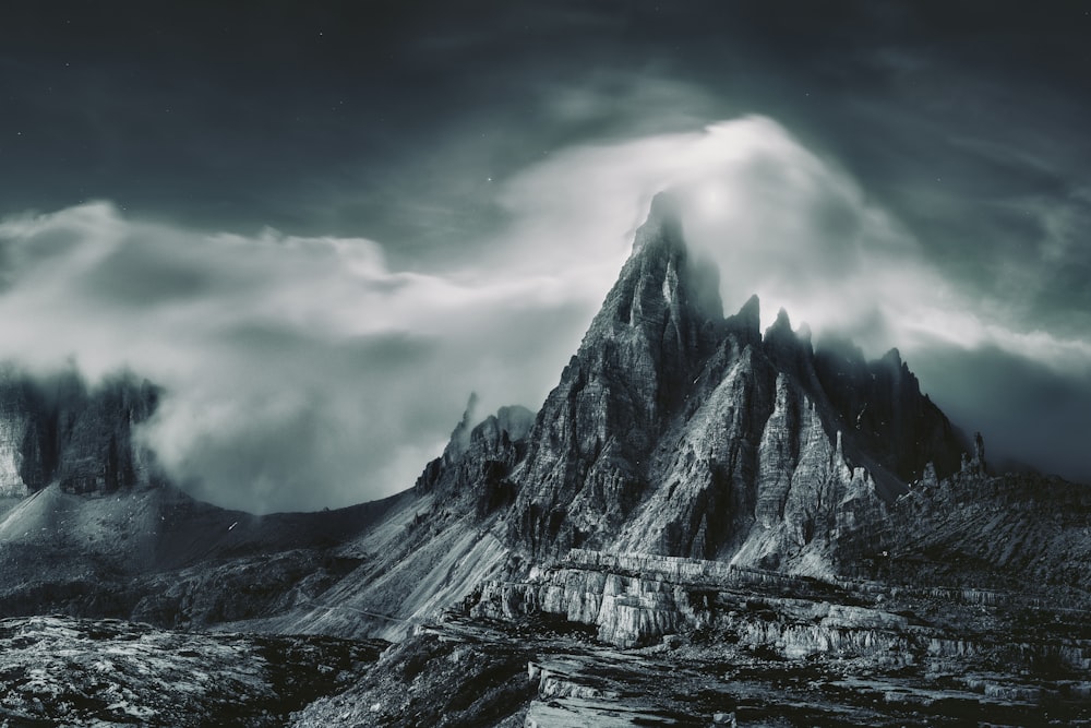 a black and white photo of a mountain