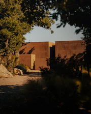 a couple of brown buildings sitting next to each other