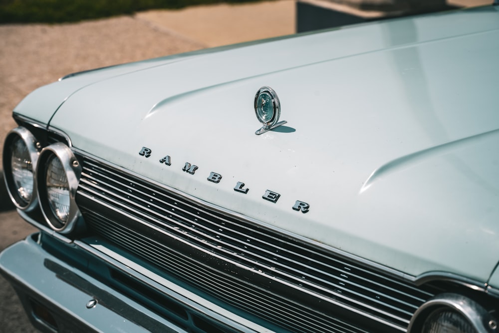 a close up of the front of a classic car