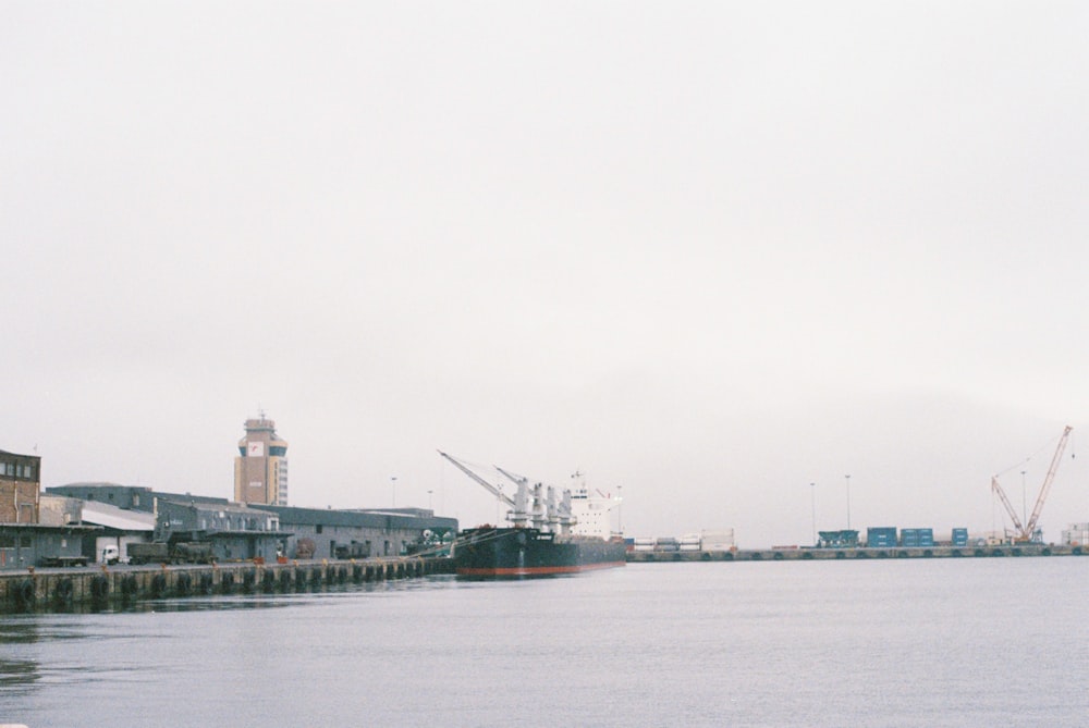 a large body of water next to a dock