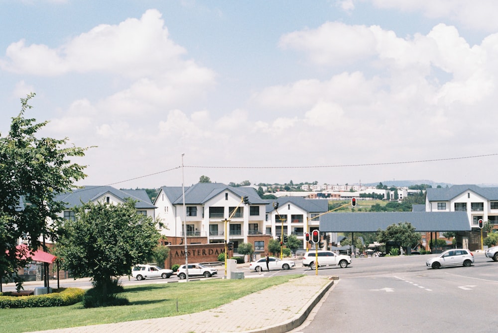 a street with cars parked on the side of it