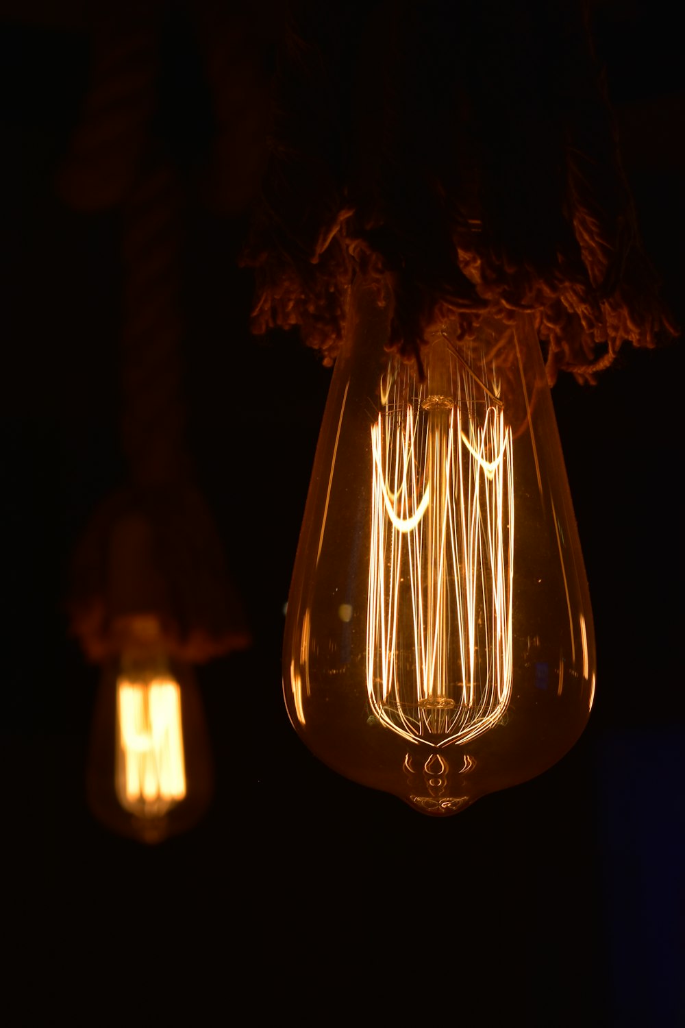a light bulb that is lit up in the dark