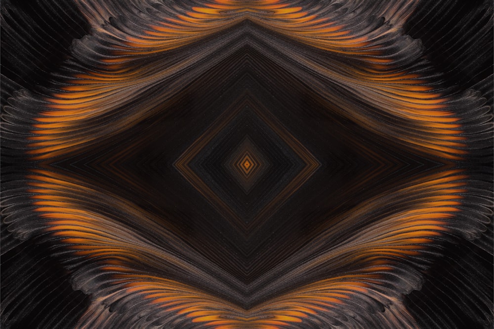 an abstract image of a black and orange pattern