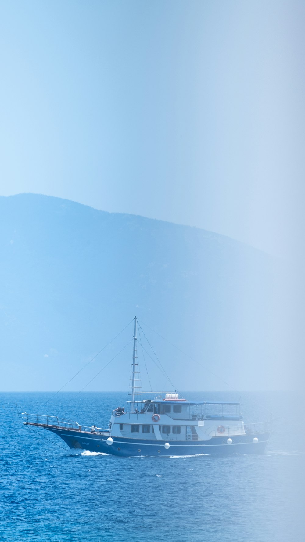 a large boat in the middle of the ocean