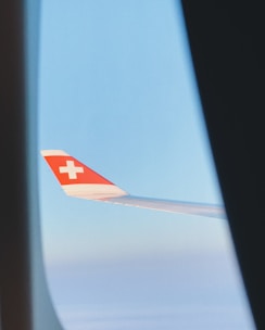 a view of the wing of an airplane from inside the plane