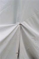 Close-up of durable tent fabric showcasing water-resistant texture and reinforced seams.
