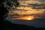 A beautiful sunset over a scenic Angolan landscape.