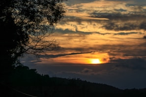 A beautiful sunset over a scenic Angolan landscape.