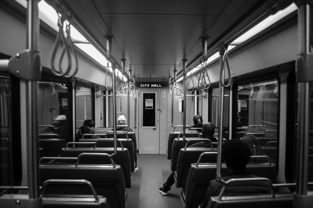 a black and white photo of a subway car