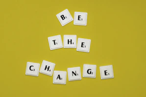 the word be the change spelled out with scrabbles
