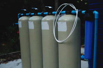 a row of water filtrators sitting next to each other