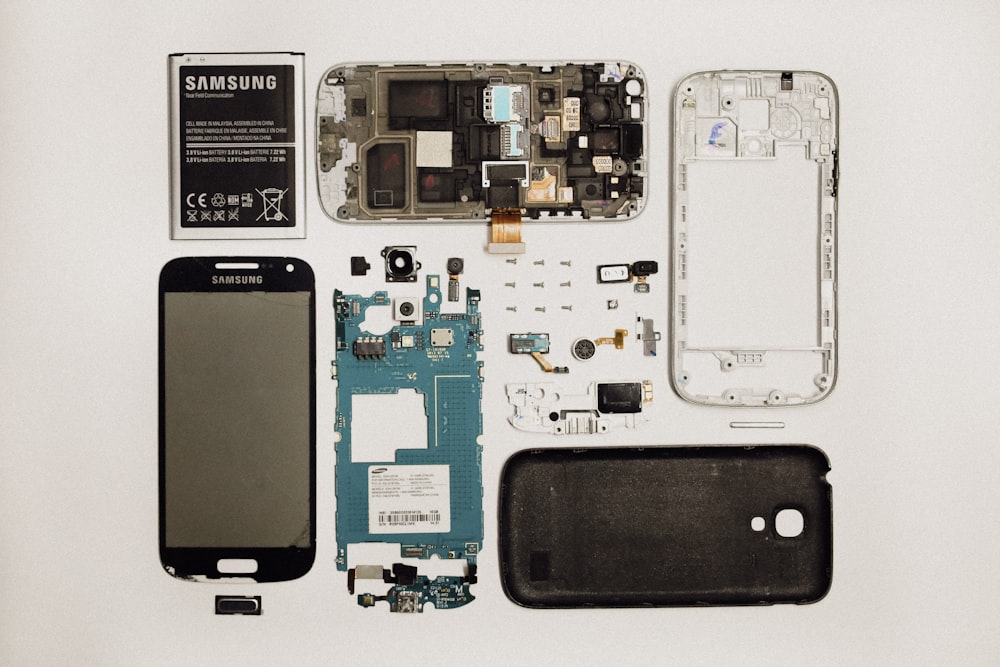 a picture of a cell phone and parts