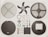 Various disassembled components of a fan displayed neatly on a flat surface. The parts include fan blades, protective grilles, electrical coils, small screws, electronic circuit board, and other mechanical pieces, all arranged in symmetrical fashion.