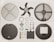 A close-up of various air conditioning spare parts neatly arranged on a workbench.