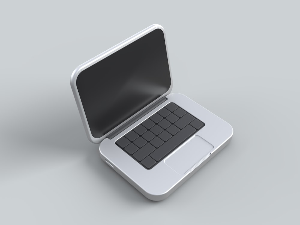 an open laptop computer sitting on top of a table