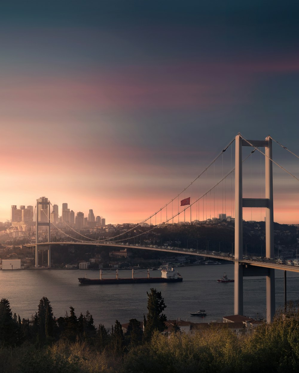 a large bridge spanning over a large body of water