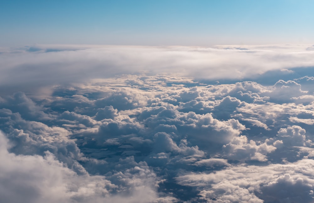 a view of the clouds from an airplane window