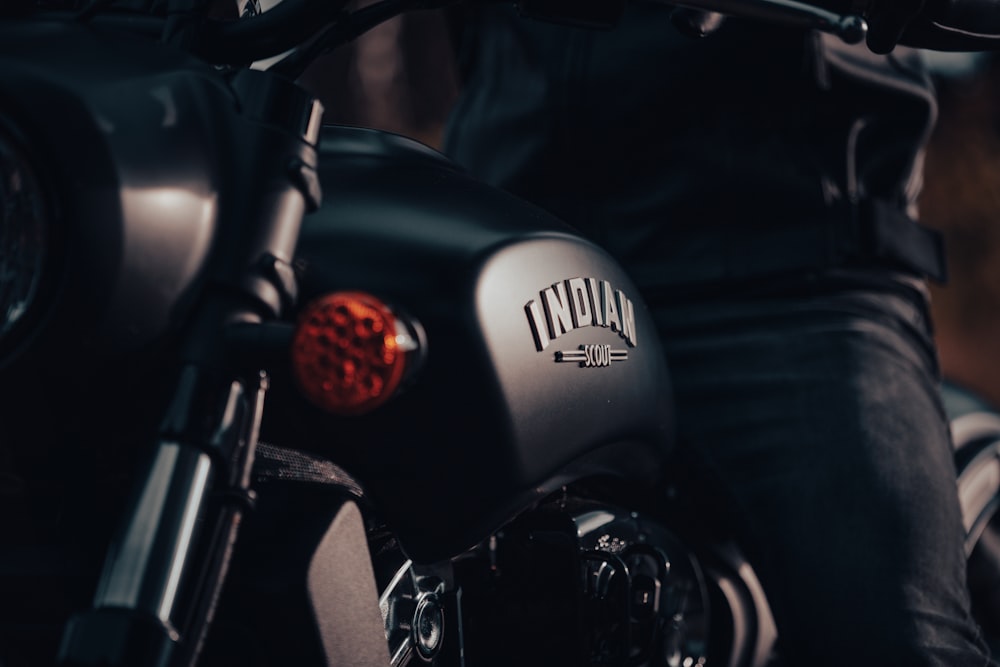 a close up of a person on a motorcycle
