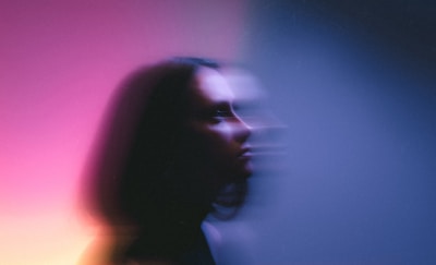 a blurry photo of a woman's face