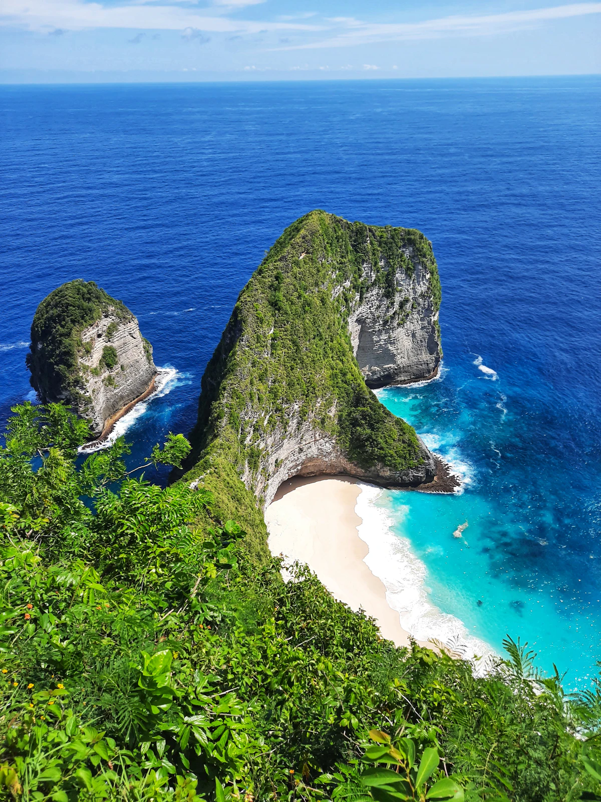 Sheltered coral reef sanctuary and swaying coconut palms at Crystal Bay