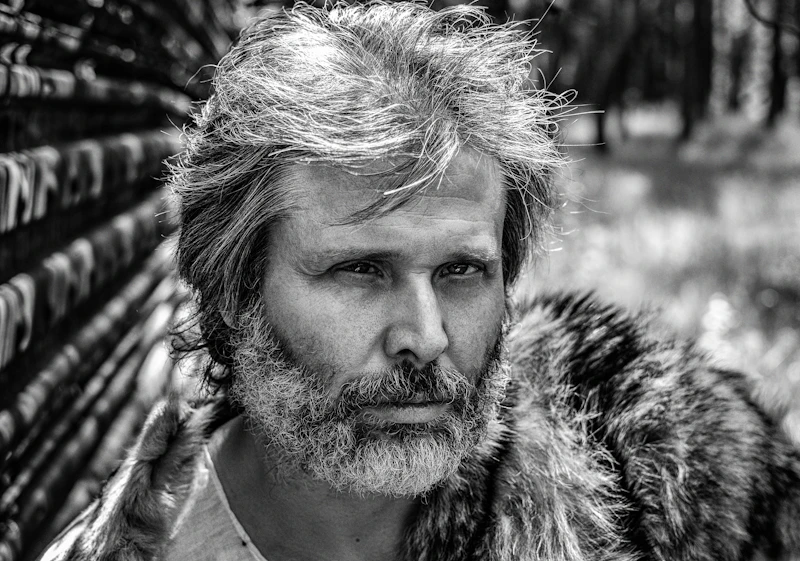 black and white portrait of a bearded mature man