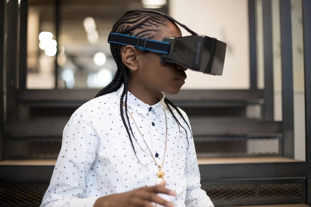 a woman wearing a pair of virtual glasses