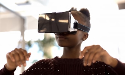 a woman wearing a virtual reality headset