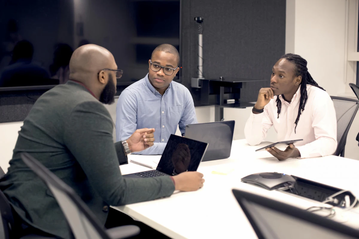 A team working together on laptops
