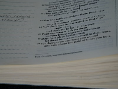 Close-up of a script page with handwritten notes highlighting comedic and provocative lines.