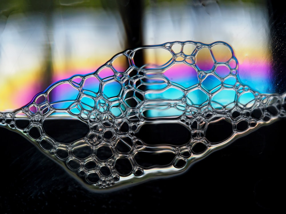 a close up of a glass with water on it