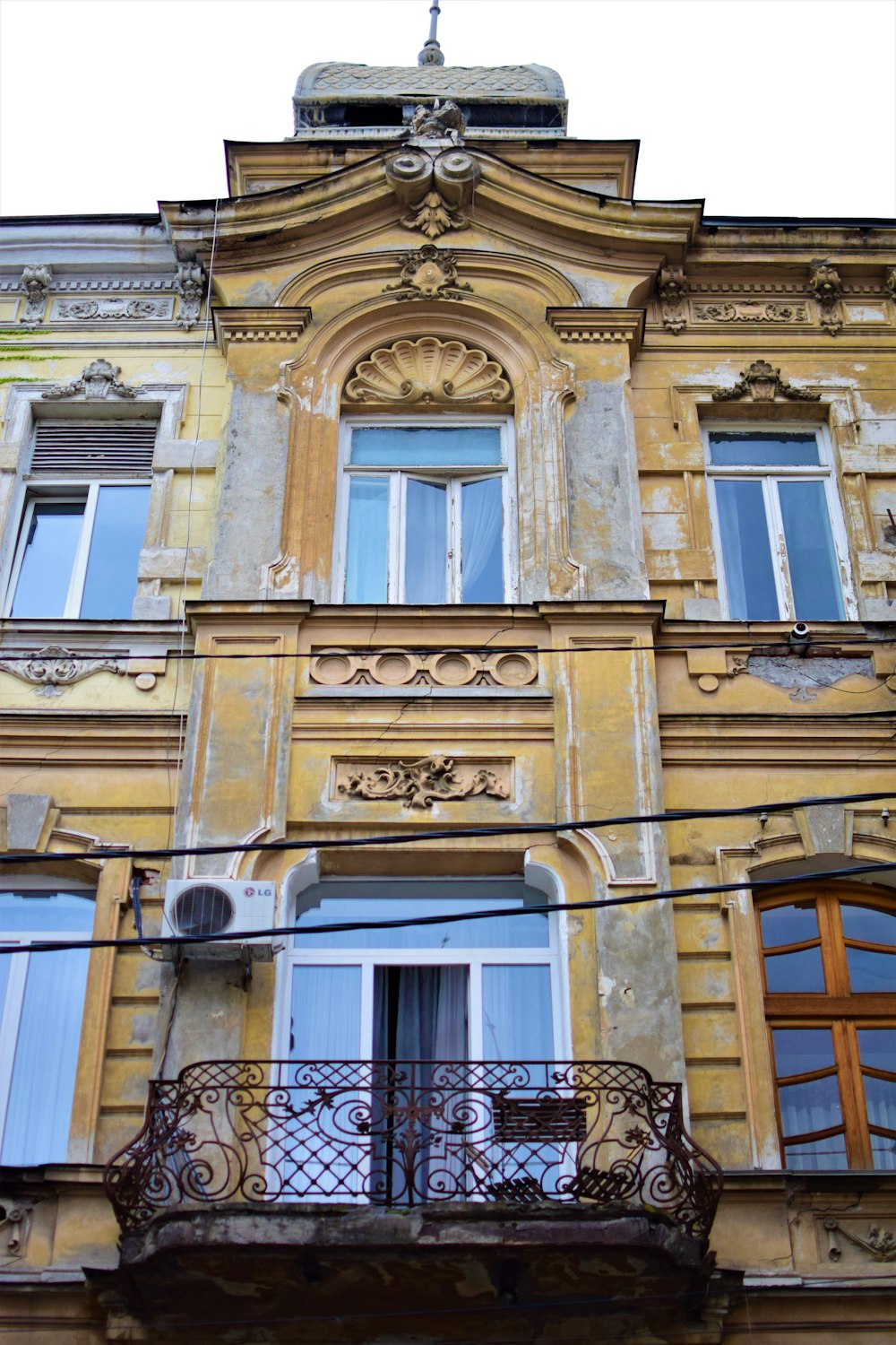 an old building with a balcony and balconies