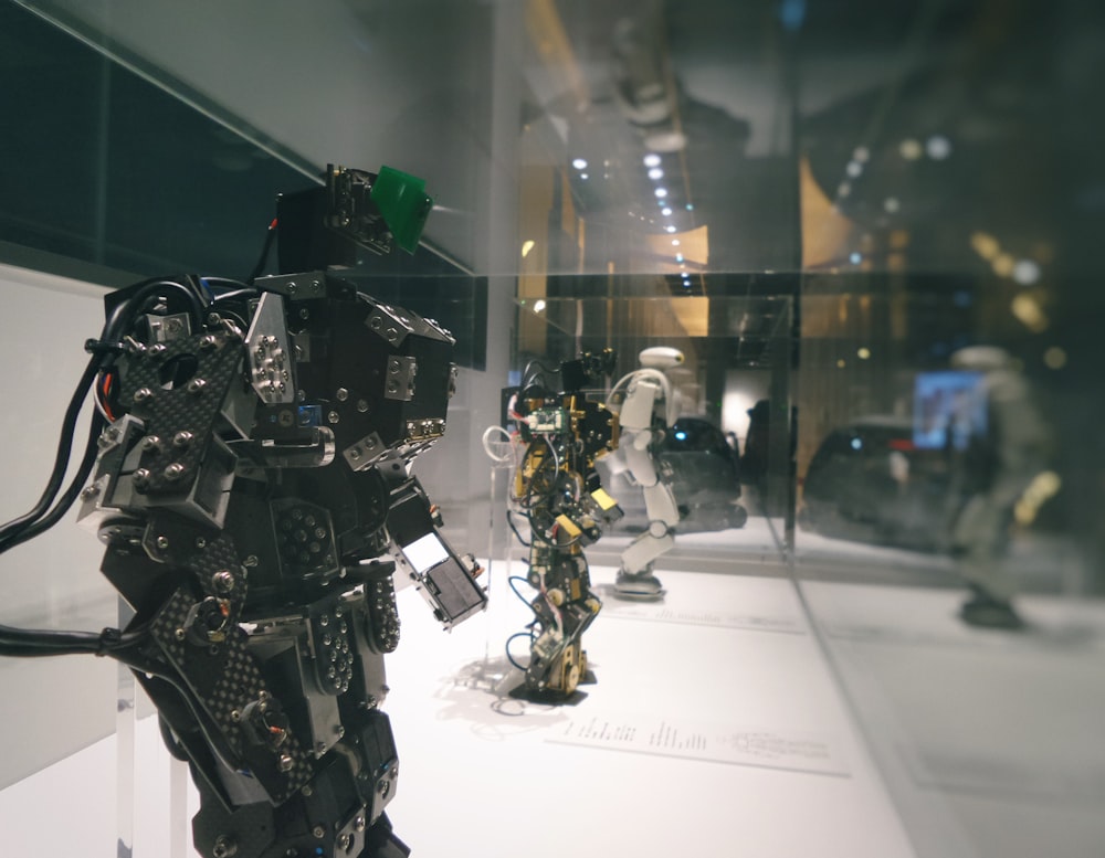 a group of robots that are on display