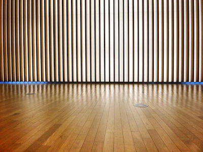 a room with a wooden wall and wooden floor