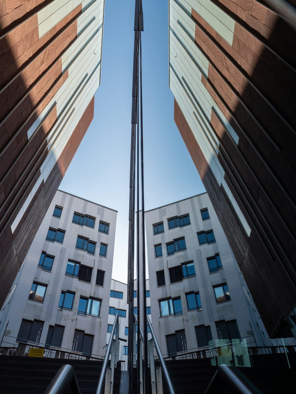 a view of a building from the bottom of the stairs