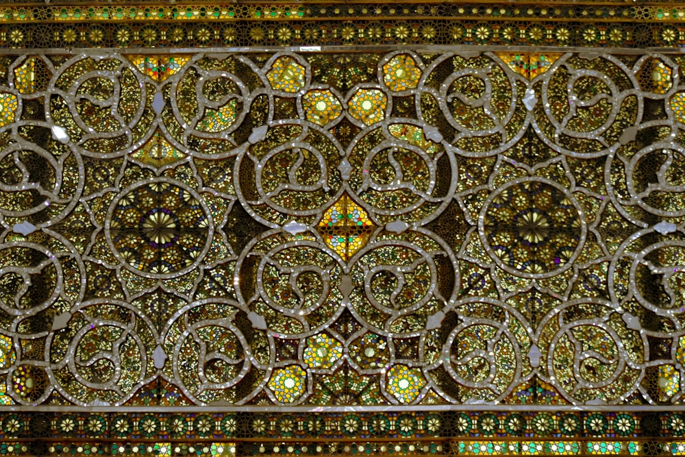 a close up of a decorative glass window