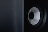 a close up of a speaker with a black background