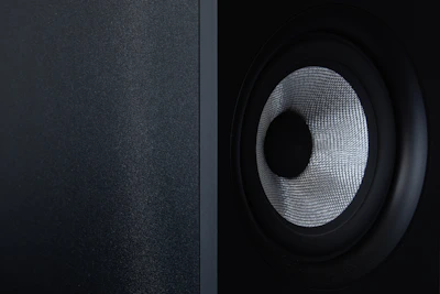 a close up of a speaker with a black background