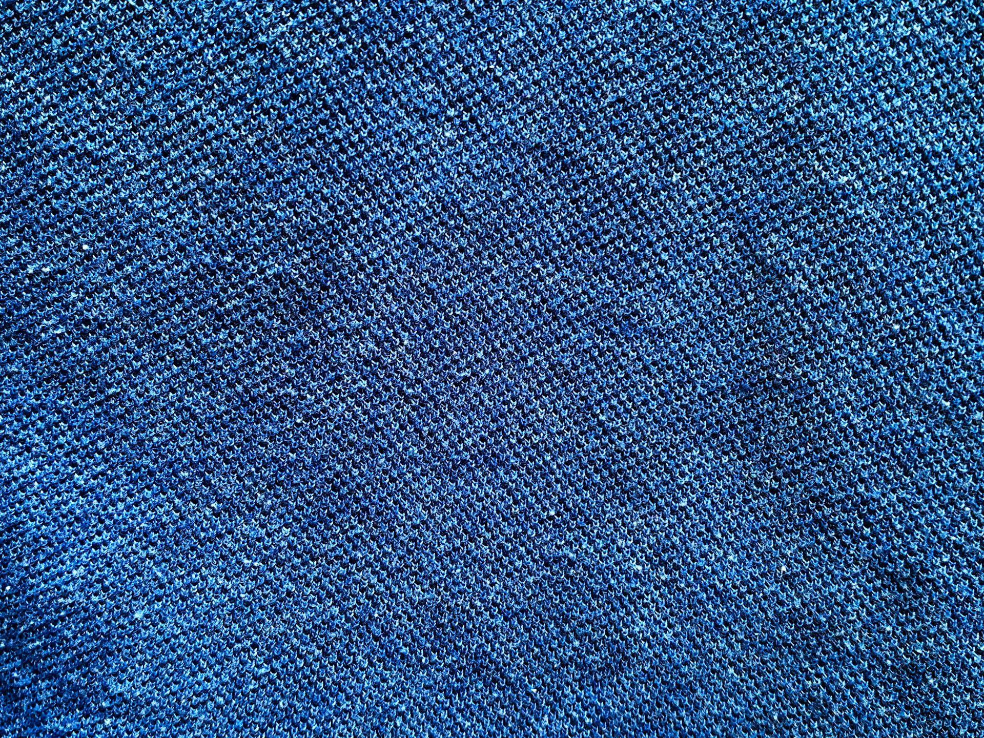 a close up of a blue fabric texture