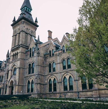 an old building with a steeple on top of it