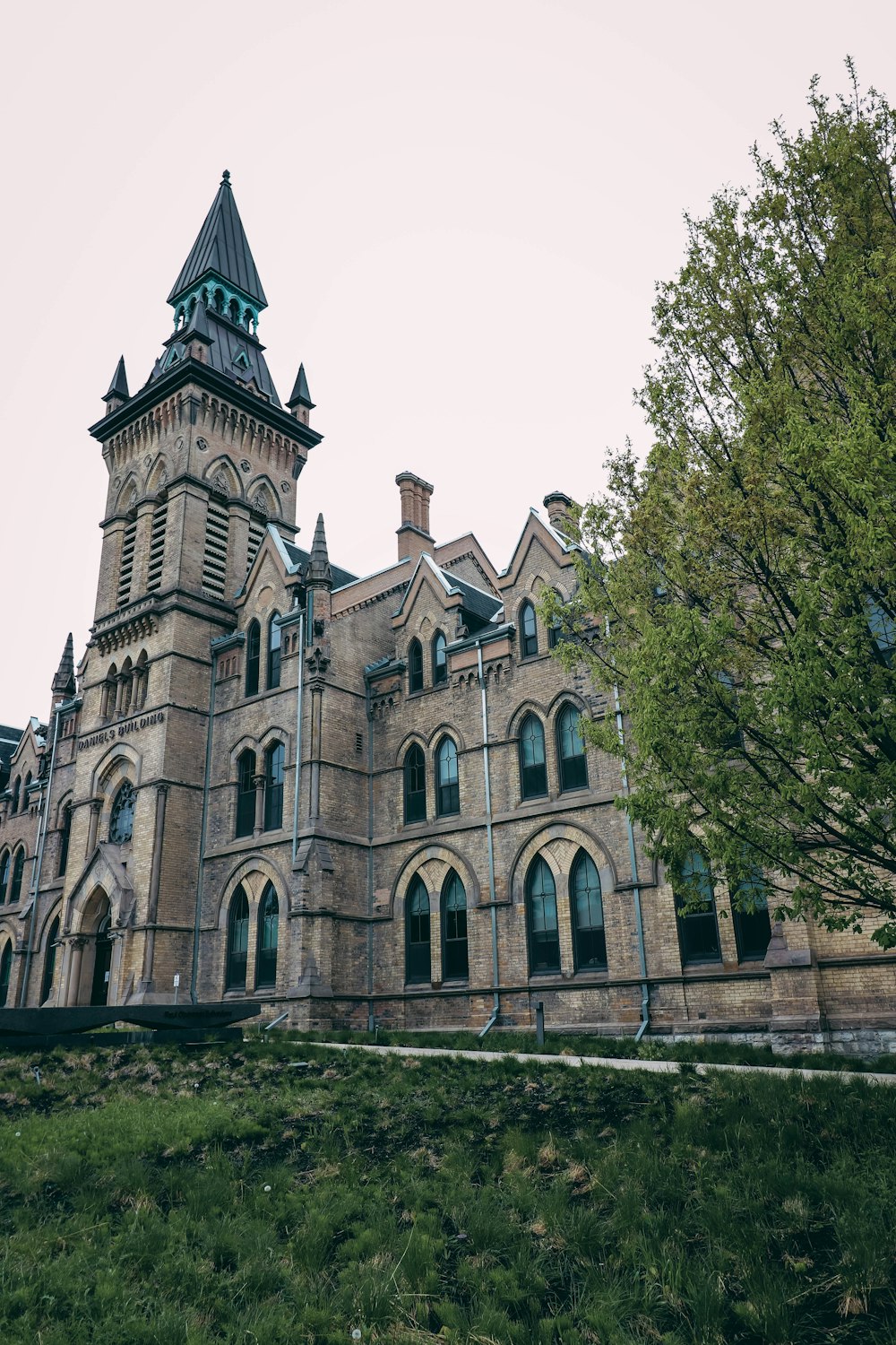 an old building with a steeple on top of it