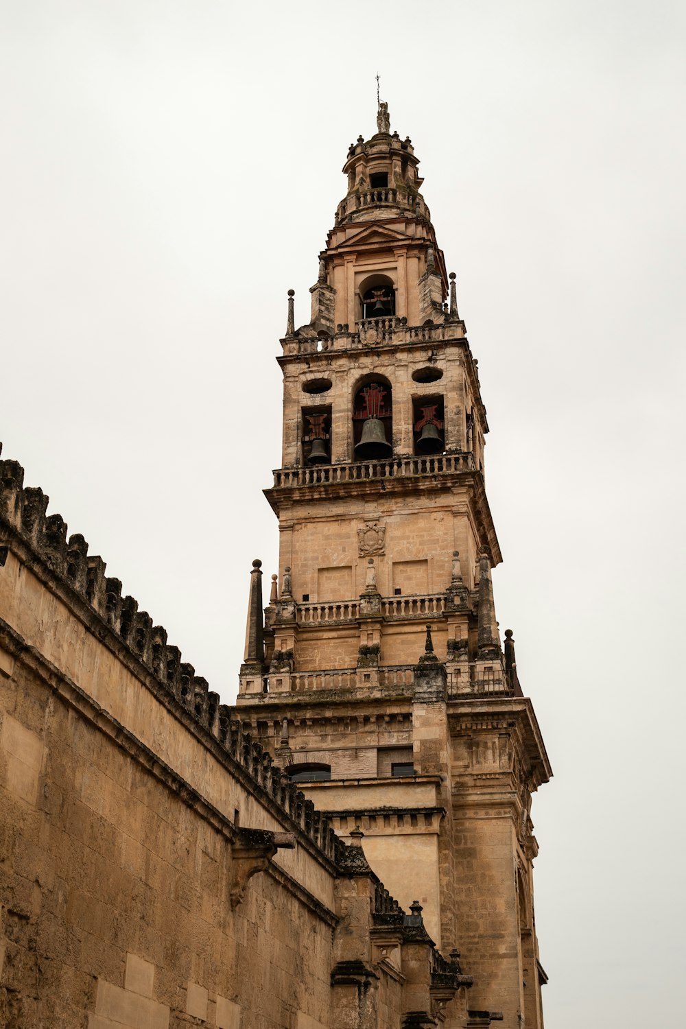 a tall tower with a clock on the top of it