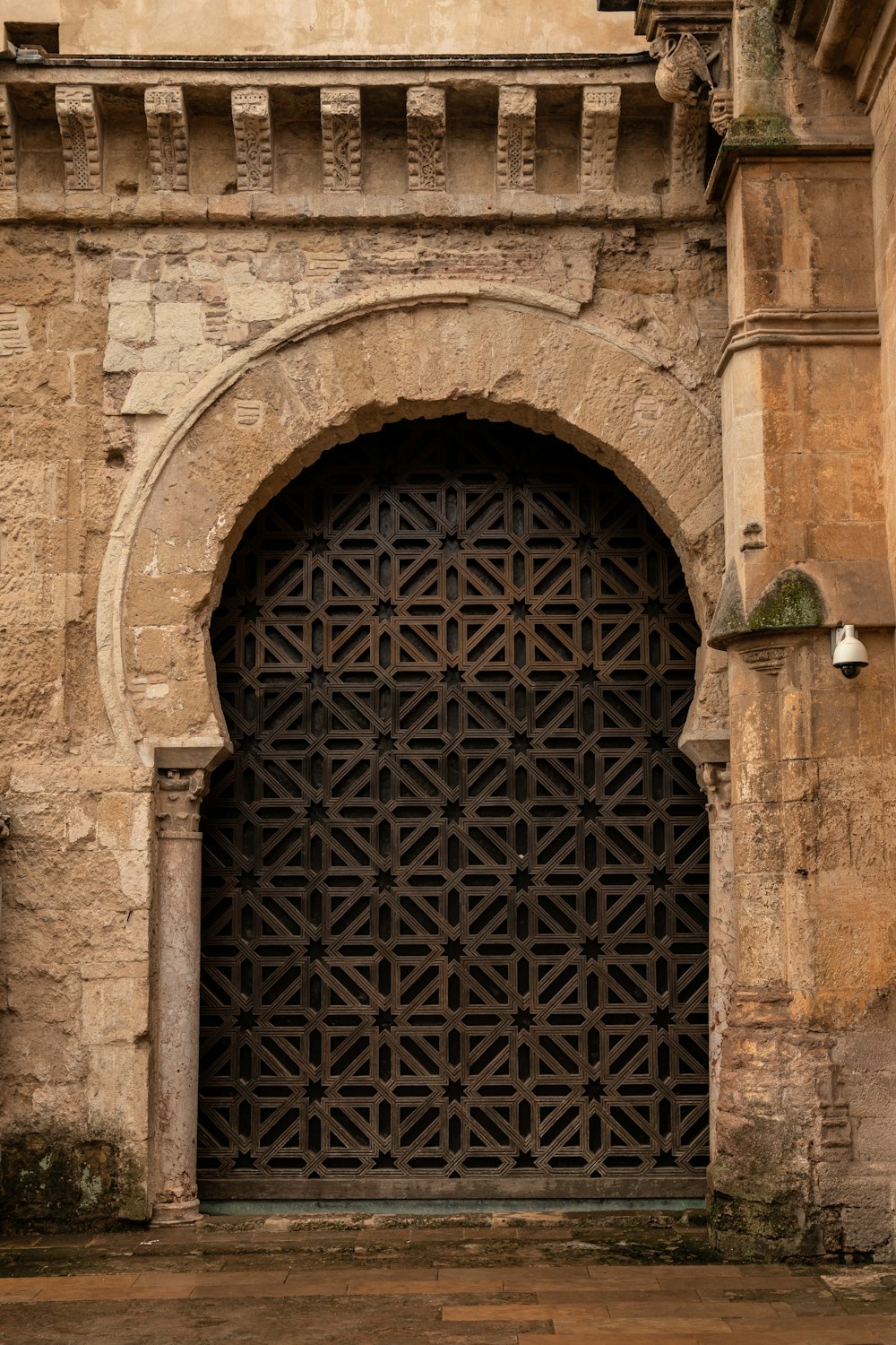 an old building with a large wooden door