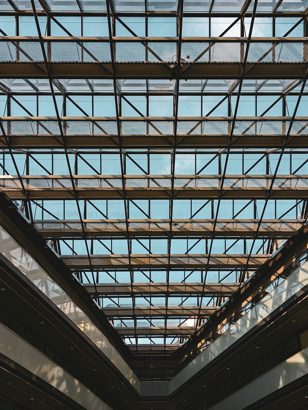 a view of the ceiling of a train station