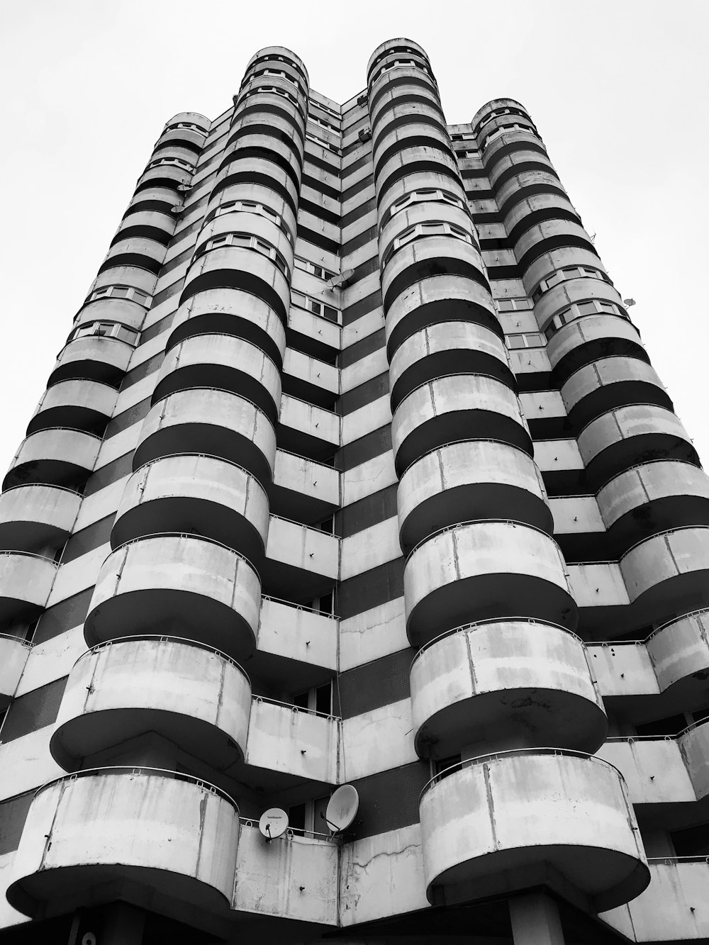 a black and white photo of a tall building