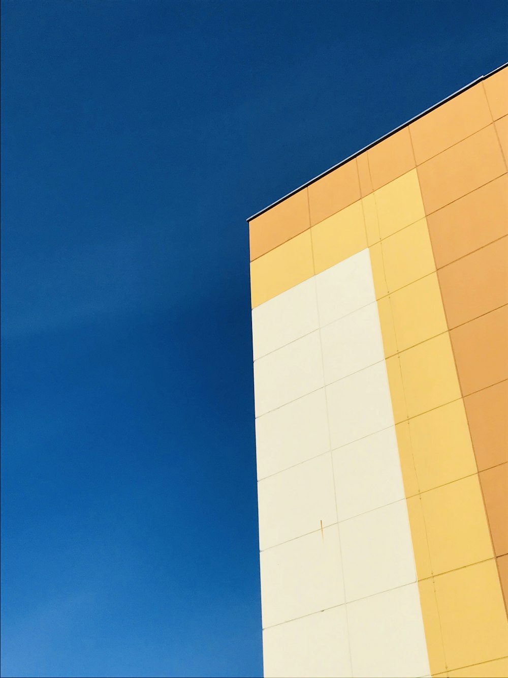 a large building with a clock on the side of it