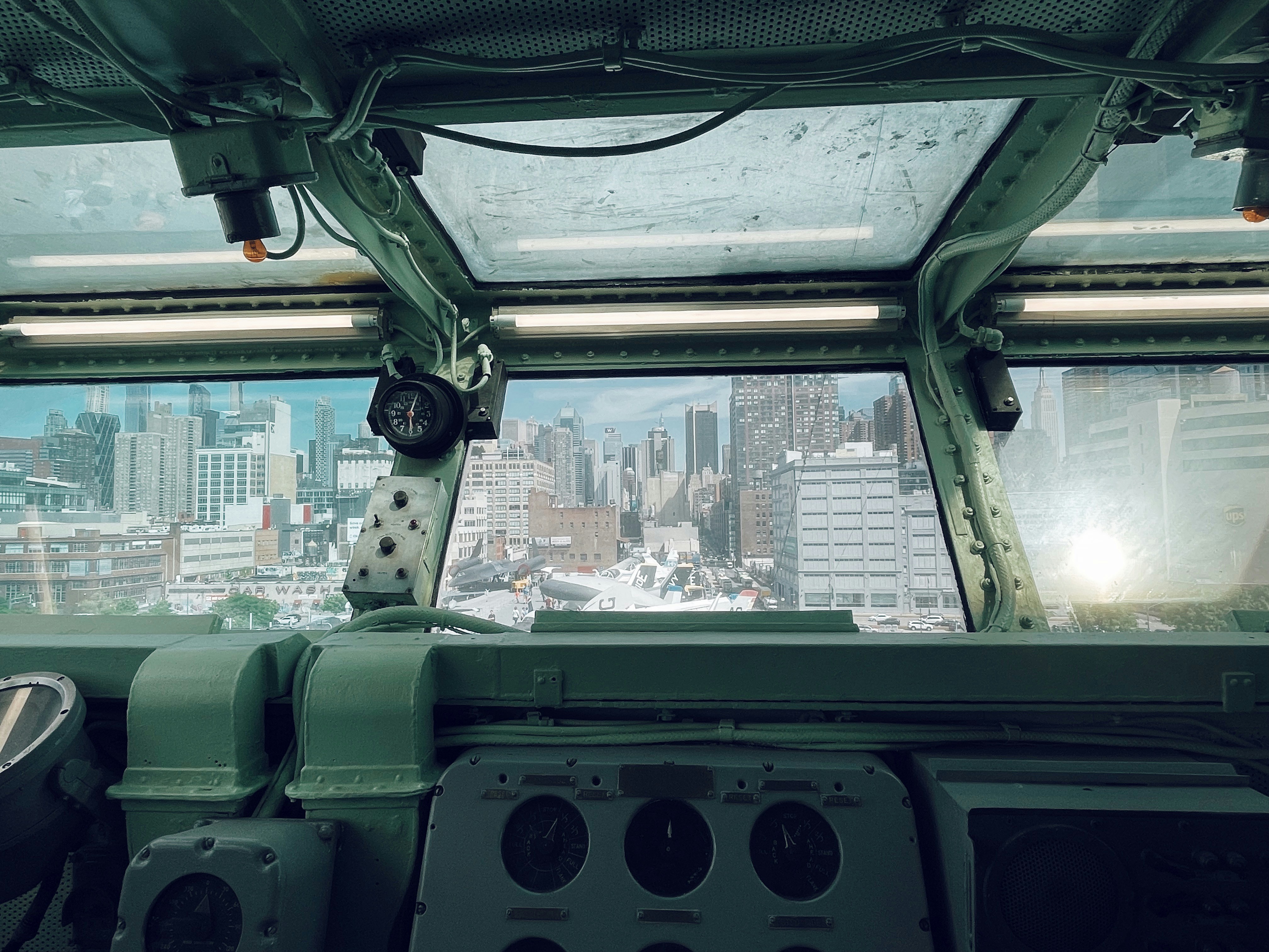a view of a city from inside a vehicle