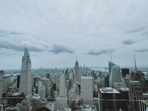 A panoramic cityscape highlighting prime investment zones with towering structures.