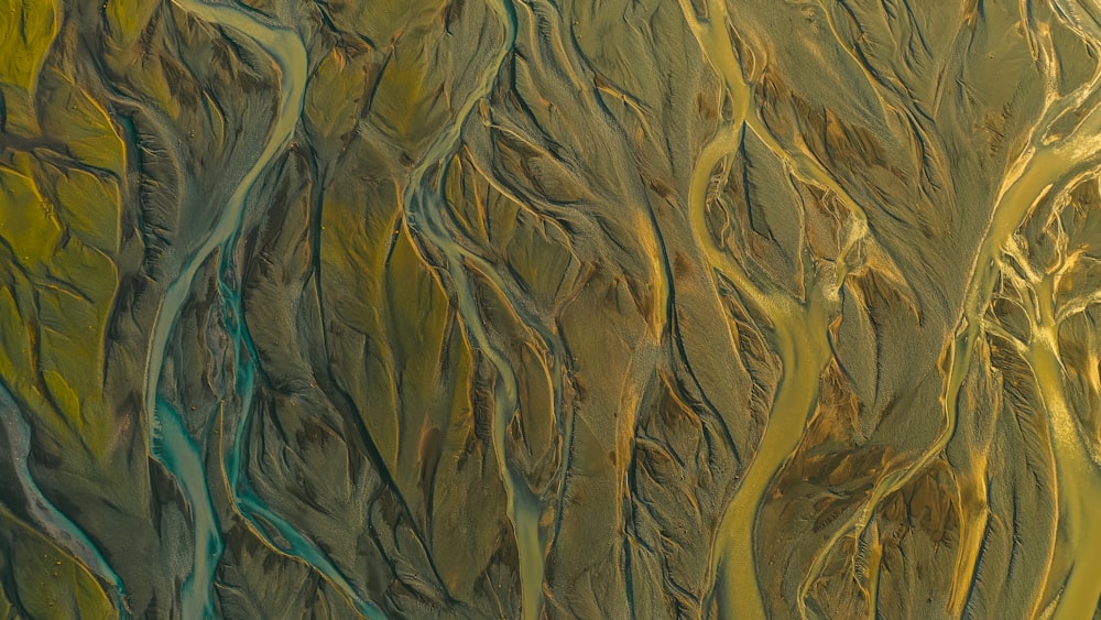 an aerial view of a river running through a valley