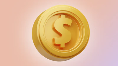 a golden button with a dollar sign on it